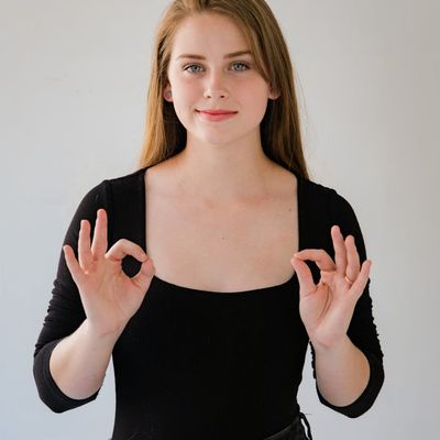 Portrait of Olga Zarichna, a smiling woman with a calm and friendly expression.